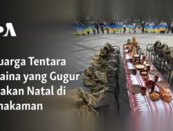 Kelurga Prajurit Ukraina yang Gugur Merayakan Natal di Tempat Pemakaman